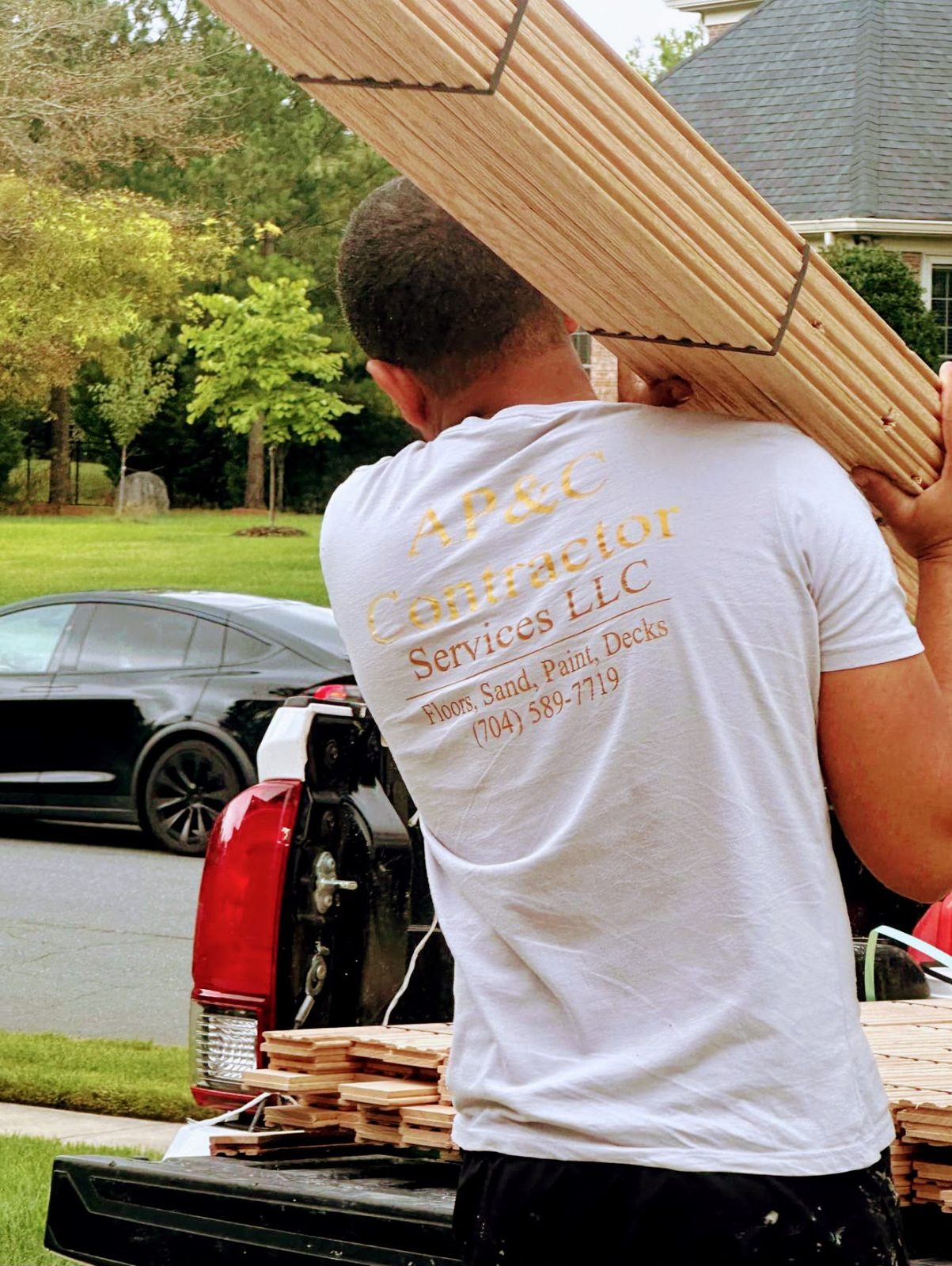 AP&C craftsmen installing premium hardwood flooring
